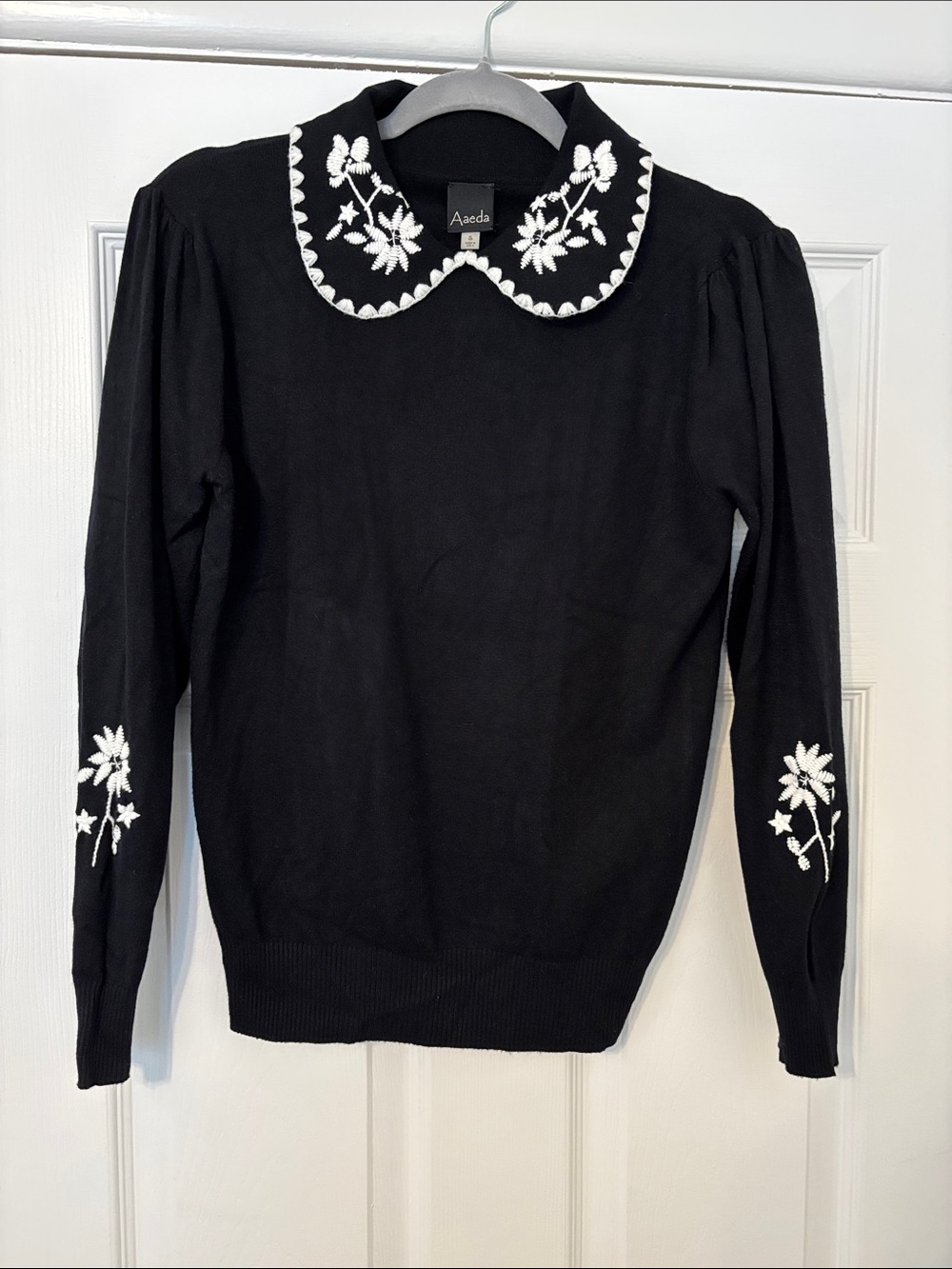 Aaeda Black Crewneck Sweater with White Embroidered Peter Pan Collar